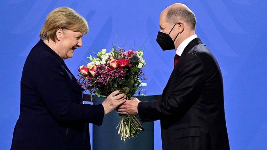 Olaf Scholz y Angela Merkel. 